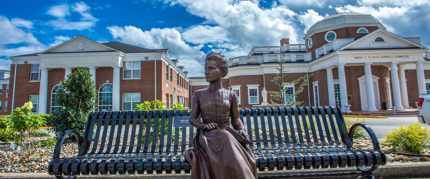 A statue of Marie Curie on the campus at Cumberlands. 