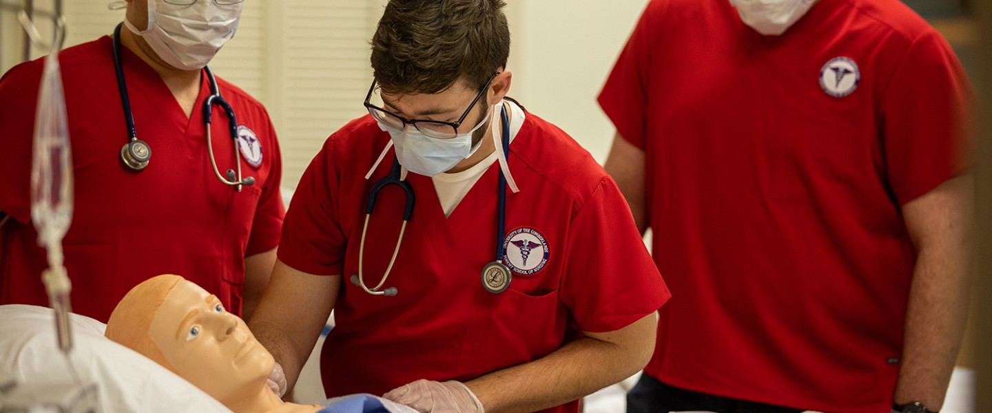 Nursing students work through an examination. 