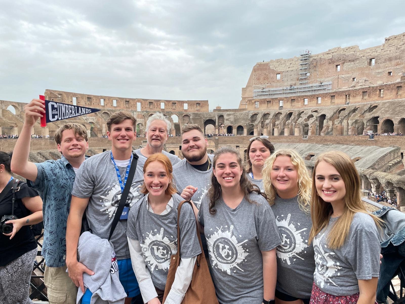 Art students pose while visiting Italy during a study abroad experience