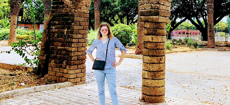 A Cumberlands student posing in a plaza in Spain 