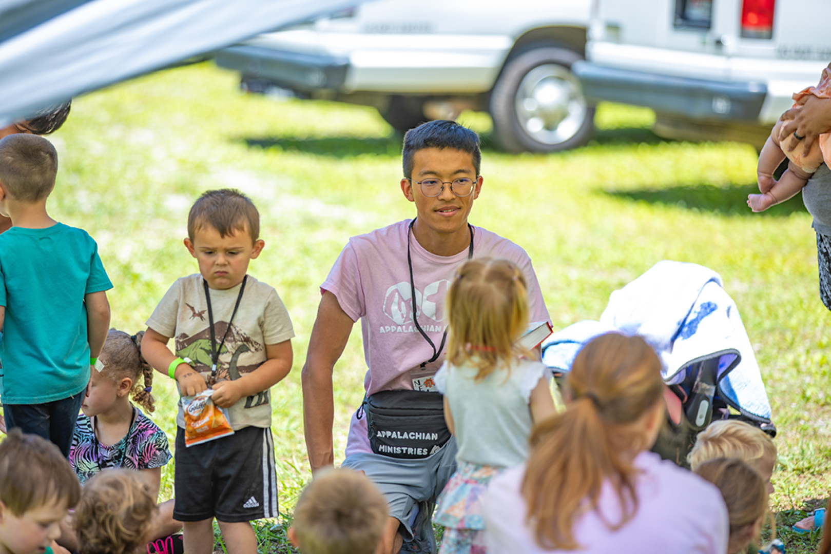 Student leading group of children