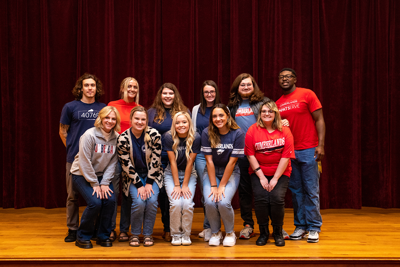 Group of students standing on stage