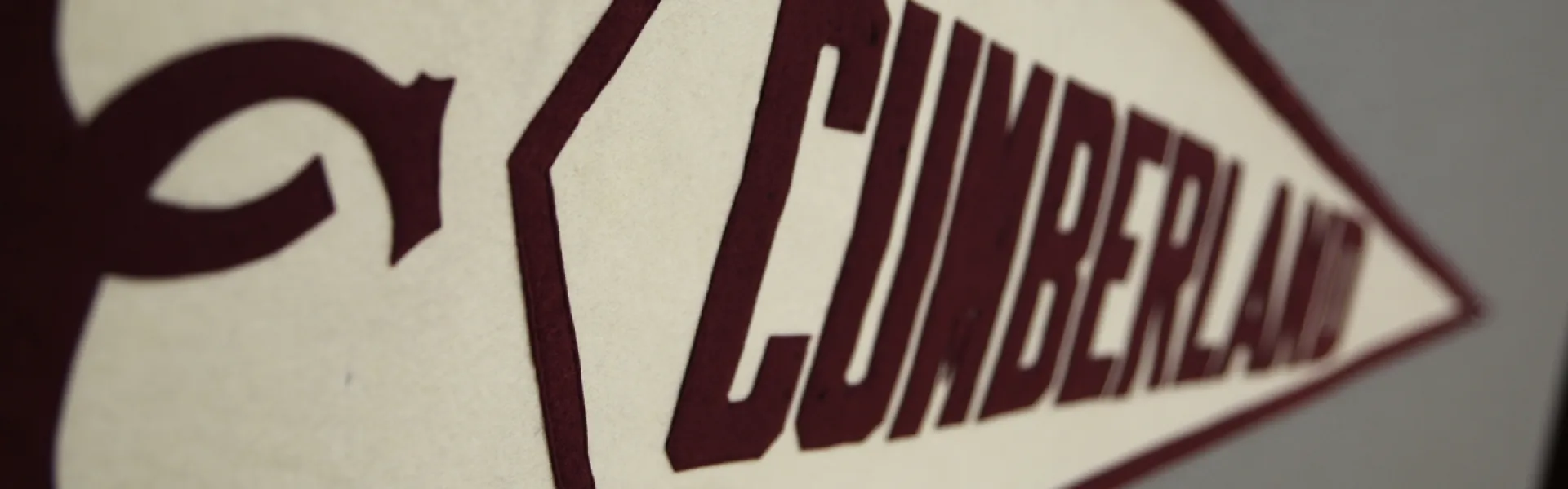 A vintage Cumberland college banner.