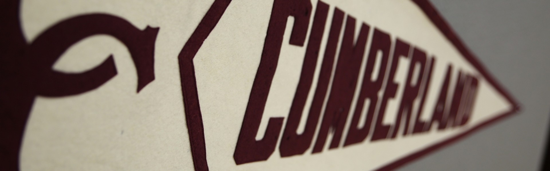 A vintage Cumberland college banner.