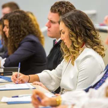 Students taking notes