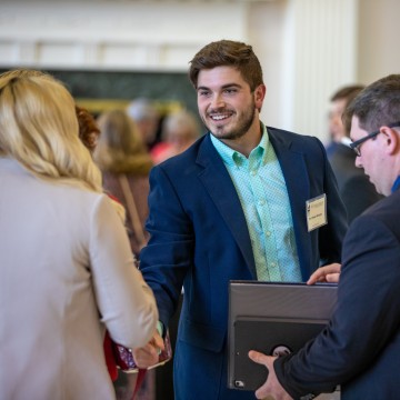 Graduate student networking with people