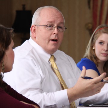 A teacher speaking to students