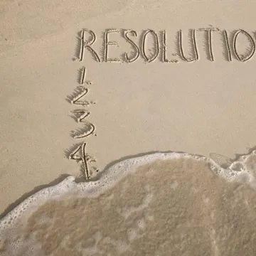 Writing on the beach in the sand