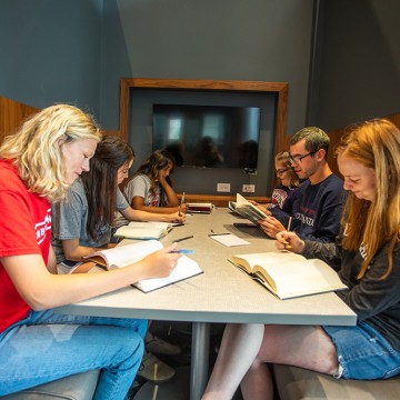 Students studying at a table