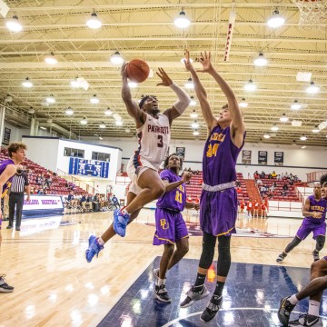 Basketball player dunking