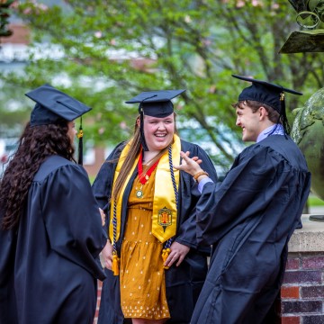 Students wearing cap and gown