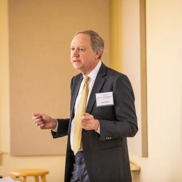 A person giving a lecture