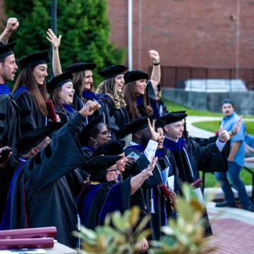 Students wearing cap and gown