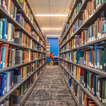 A student studying in a library