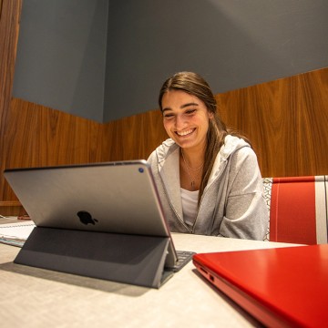 A student studying on a tablet