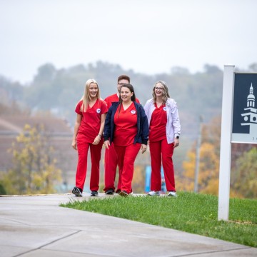 Nursing students walking on campus