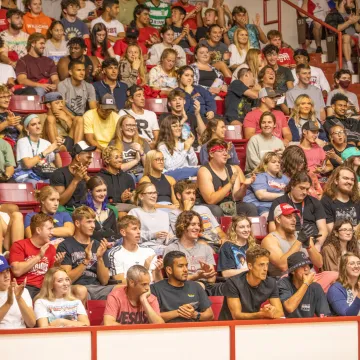 Students seated on bleachers