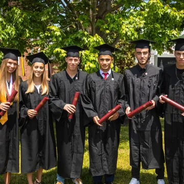 Several students wearing cap and gown