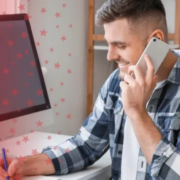 Man on Phone while Studying English