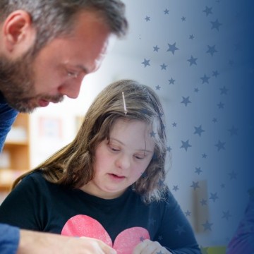 Special Education Teacher Working with Student