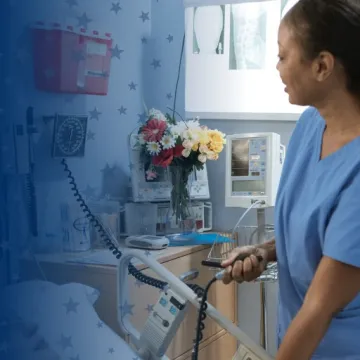 Nurse Working with Patient