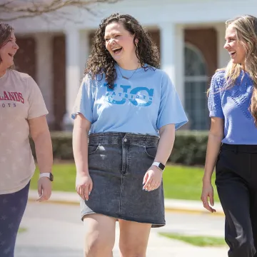 Three female students walk from BCC to Gatliff. 