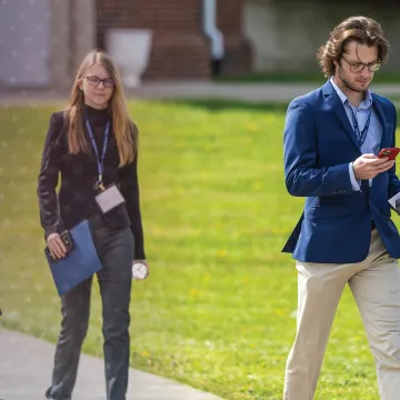 Students leave the business forum annual event. 