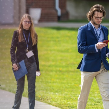 Students leave the business forum annual event. 