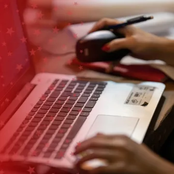 Computer Science Major Working on Laptop