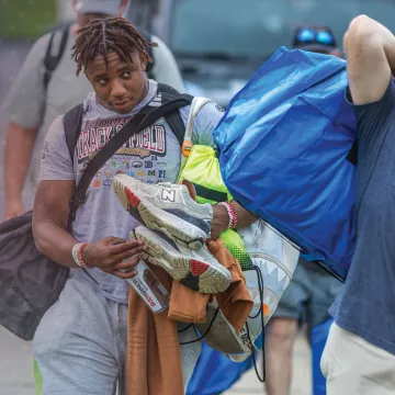 Student-athletes moving into the dorms during move-in day.