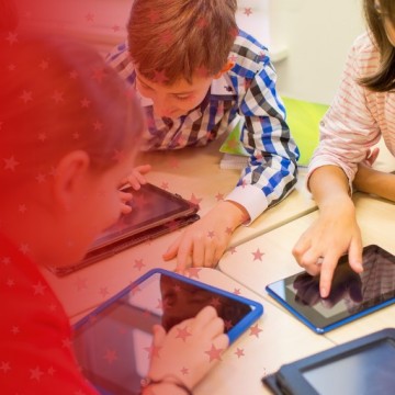 Teacher and Students Working with Digital Technology