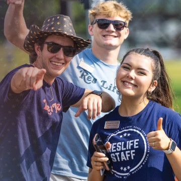 Resident life staff welcome students to campus. 