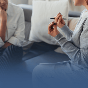 Counselor Speaking with Patient on Couch