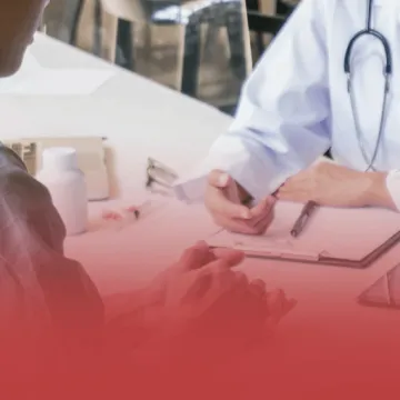 Nurse Speaking with Patient