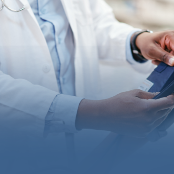 FNP with Patient Taking Blood Pressure