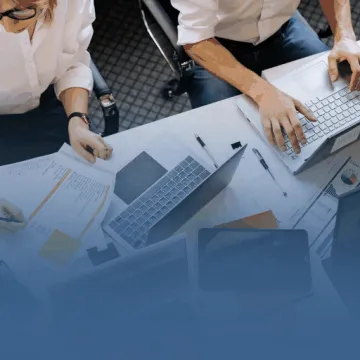 Office Workers Going Through Data