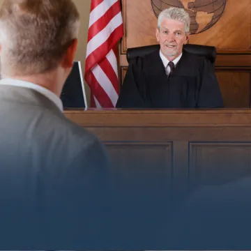 Judge with Lawyers in Courtroom