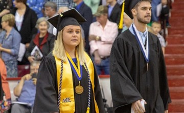Students wearing cap and gown