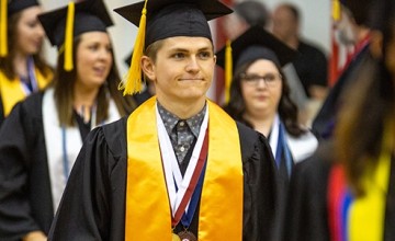 Students wearing cap and gown