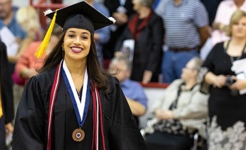 A student wearing a cap and gown