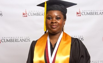 Image of a graduate in cap and gown