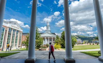 Students walk to class near the Grace Crum Rollins Center