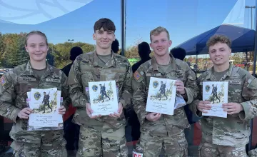 ROTC cadets celebrate completion of a Ruck March 