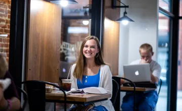 A student studies inside Cumberlands coffee shop. 