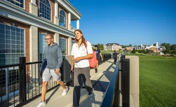 Students walk across the viaduct on the first day of classes. 