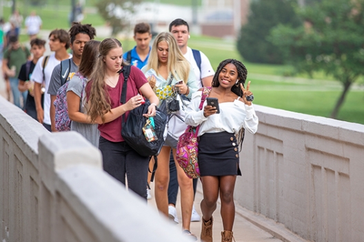 Students walk across the viaduct on the first day of class 