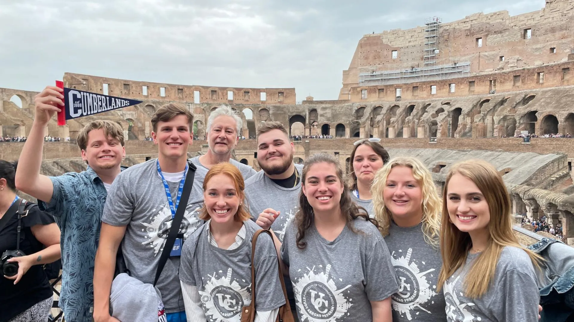 Art students pose while visiting Italy during a study abroad experience