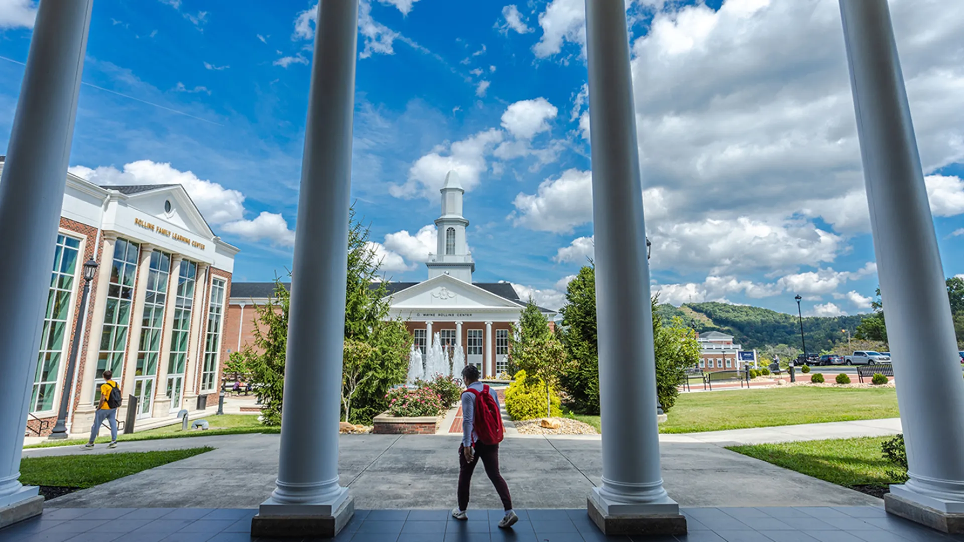 Students walk to class near the Grace Crum Rollins Center