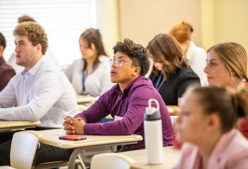 Cumberlands student watch a presentation during the business forum. 