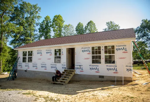The frame of a new home being built by Mountain Outreach